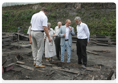 Prime Minister Vladimir Putin visiting an ancient part of Veliky Novgorod discovered by archaeologists
