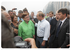 Prime Minister Vladimir Putin inspecting the accommodations for evacuees from areas affected by wildfires