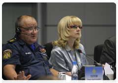 Deputy Minister of Civil Defence, Emergencies and Disaster Relief Pavel Popov, Minister of Healthcare and Social Development Tatiana Golikova and Head of the Federal Service for Supervision of Consumer Protection and Welfare Gennady Onishchenko