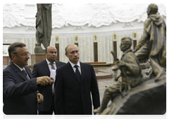 Prime Minister Vladimir Putin examining proposed designs for the We Fought Fascism Together memorial, to be located on Poklonnaya Hill in Moscow. The new memorial will replace the Glory Memorial in Kutaisi, which was destroyed by the Georgian government last year