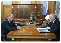 Prime Minister Vladimir Putin at a meeting with Farit Mukhametshin, head of the Federal Agency for the Commonwealth of Independent States, Compatriots Living Abroad and International Cultural Cooperation