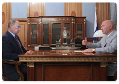 Prime Minister Vladimir Putin at the working meeting with Moscow Mayor Yury Luzhkov