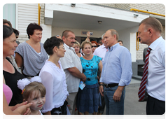 Prime Minister Vladimir Putin talking to residents of the village of Polyana in the Ryazan Region