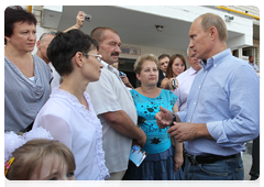 Prime Minister Vladimir Putin talking to residents of the village of Polyani in the Ryazan Region