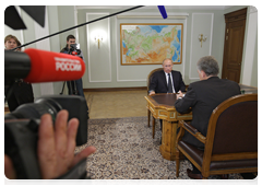Prime Minister Vladimir Putin meeting with Minister of Industry and Trade Viktor Khristenko