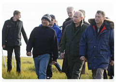 Prime Minister Vladimir Putin visiting the sites explored by the Russian and German expedition Lena 2010 and spoke with the research team