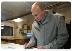 Prime Minister Vladimir Putin on board the trawler Mikhail Staritsyn