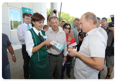 Prime Minister Vladimir Putin stopping at a petrol station on the road from Khabarovsk to Chita
