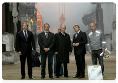 Prime Minister Vladimir Putin visiting a copper smelter at Norilsk Nickel