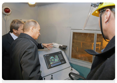Prime Minister Vladimir Putin visiting a copper smelter at Norilsk Nickel