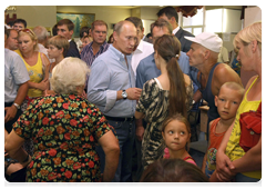 Prime Minister Vladimir Putin visiting temporary shelters for fire victims in the Voronezh Region