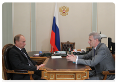 Prime Minister Vladimir Putin discussing preparations in schools and universities for new academic year with Minister of Education and Science Andrei Fursenko