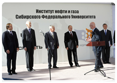 Prime Minister Vladimir Putin at the opening ceremony of new Oil and Gas Institute building at Siberian Federal University during his trip to Krasnoyarsk