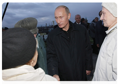 Prime Minister Vladimir Putin visiting the Norilsk Golgotha memorial, built to commemorate the memory of those imprisoned in Norillag