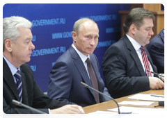 Prime Minister Vladimir Putin, Deputy Prime Minister and Chief of the Government Staff Sergei Sobyanin, left, and Minister of Energy Sergei Shmatko, right