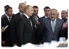 Prime Minister Vladimir Putin visiting the pavilions of the IX International Investment Forum in Sochi