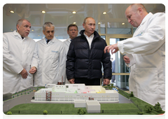 Prime Minister Vladimir Putin at the new factory Concord, which supplies pre-prepared meals to schools