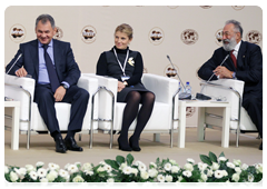 Minister of Civil Defence, Emergencies and Disaster Relief Sergei Shoigu, Editor in Chief of the Russian News & Information Agency RIA Novosti Svetlana Mironyuk and State Duma Deputy and oceanologist Artur Chilingarov