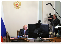 Prime Minister Vladimir Putin holding a video conference with Khabarovsk, where the Amur highway has been completed