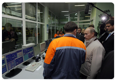 Prime Minister Vladimir Putin touring the Mondi Syktyvkarsky Paper Plant