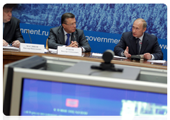 Prime Minister Vladimir Putin, First Deputy Prime Minister Viktor Zubkov and  Head of the Federal Agency for Forestry Viktor Maslyakov at a meeting on timber industry investment projects