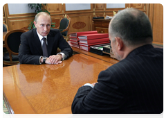 Prime Minister Vladimir Putin meeting with Chairman of the Board of Novolipetsk Steel (NLMK) Vladimir Lisin