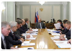 Prime Minister Vladimir Putin holding a meeting in Novo-Ogarevo on the Defence Ministry’s budget