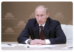 Prime Minister Vladimir Putin holding a video conference on combating wildfires in the Altai Territory and providing relief to the population