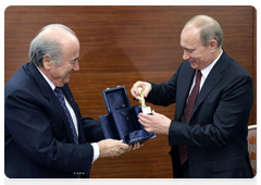 Prime Minister Vladimir Putin at a meeting with FIFA president Joseph Blatter