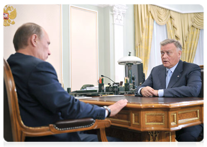 Prime Minister Vladimir Putin at a meeting with Russian Railways CEO Vladimir Yakunin