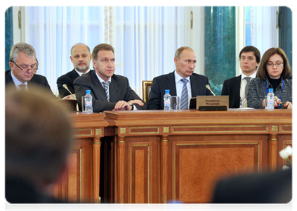 Prime Minister Vladimir Putin, First Deputy Prime Minister Igor Shuvalov, Minister of Economic Development Elvira Nabiullina and Minister of Industry and Trade Viktor Khristenko at a meeting of the EurAsEC Interstate Council at the heads of government level