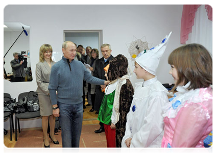 Prime Minister Vladimir Putin visiting the Antonovsky Village Community Centre