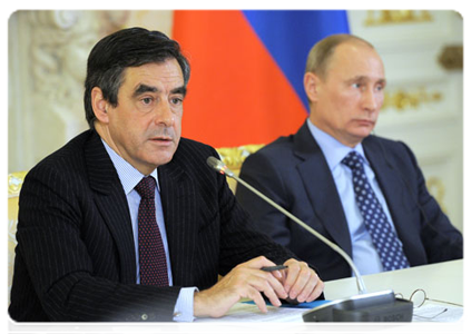 Prime Minister Vladimir Putin and his French counterpart, Francois Fillon, hold joint news conference