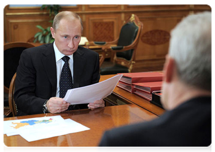 Prime Minister Vladimir Putin during a meeting with Minister of Education and Science Andrei Fursenko