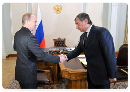 Prime Minister Vladimir Putin meets with Deputy Prime Minister Igor Sechin