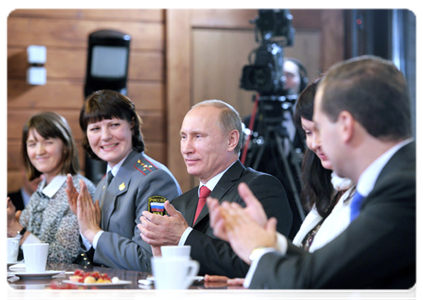 President Dmitry Medvedev and Prime Minister Vladimir Putin meet with Women’s Forum participants