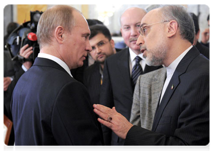 Prime Minister Vladimir Putin and Iranian Foreign Minister Ali Akbar Salehi at an expanded meeting of the SCO heads of government