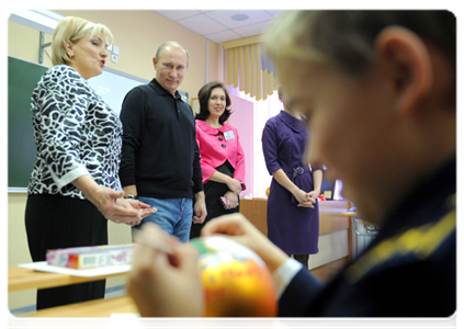 Prime Minister Vladimir Putin visiting the Evrika lyceum in the town of Cheryomushki