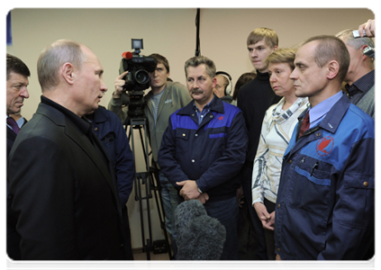 Prime Minister Vladimir Putin meets with workers of the Baltiysky Zavod shipyard