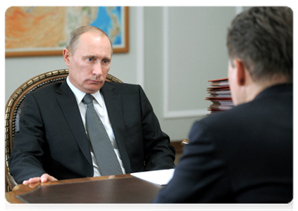 Prime Minister Vladimir Putin meets with Gazprom CEO Alexei Miller