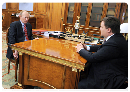 Prime Minister Vladimir Putin during a meeting with ASI General Director Andrei Nikitin