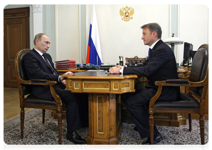 Prime Minister Vladimir Putin meeting with Sberbank CEO German Gref