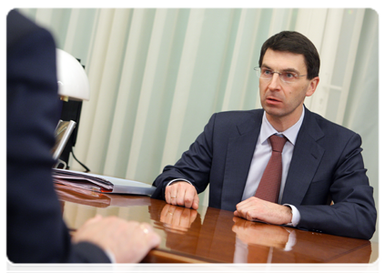 Minister of Communications and Mass Media Igor Shchegolev during a meeting with Prime Minister Vladimir Putin