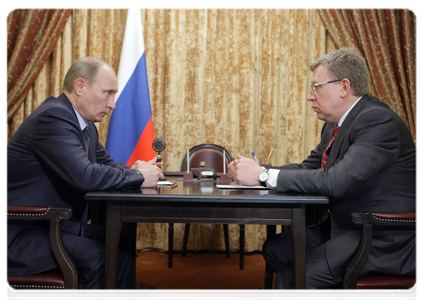 Prime Minister Vladimir Putin with Deputy Prime Minister and Finance Minister Alexei Kudrin