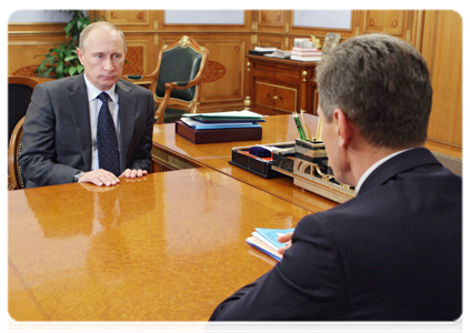 Prime Minister Vladimir Putin meets with Deputy Prime Minister Dmitry Kozak