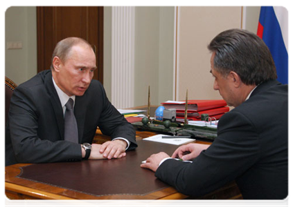 Prime Minister Vladimir Putin with Minister of Sport, Tourism and Youth Policy Vitaly Mutko