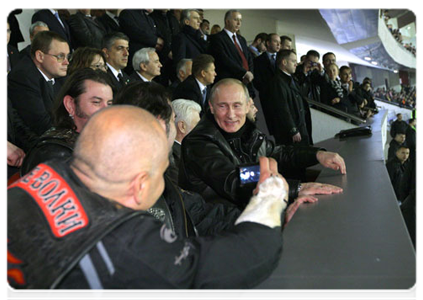 Vladimir Putin meets with members of a motorcycle club and attends a game between youth football clubs Zenit and Crvena Zvezda