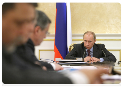 Prime Minister Vladimir Putin holding a meeting to discuss the issue of mine safety supervision