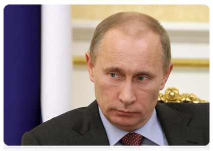 Prime Minister Vladimir Putin holding a meeting to discuss the issue of mine safety supervision