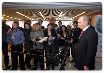 Prime Minister Vladimir Putin speaks to the media following national forum of medical workers
